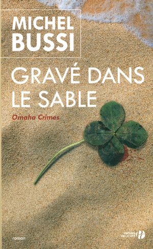 Grave dans le sable